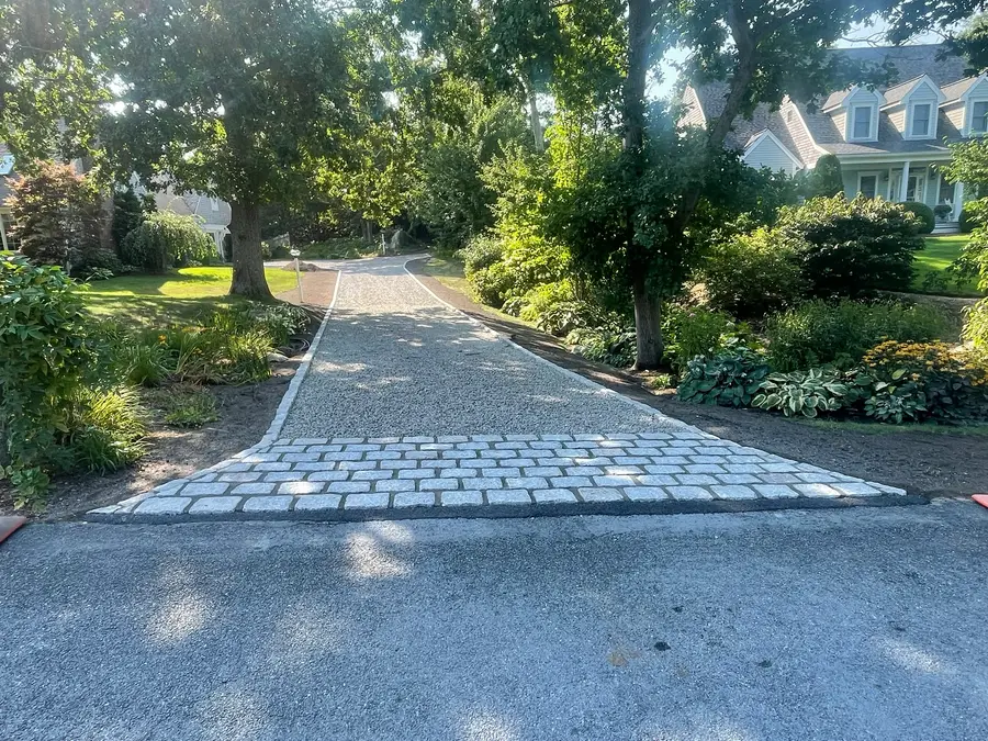 Cobblestone driveway apron installed by John G. Sears & Son on Cape Cod