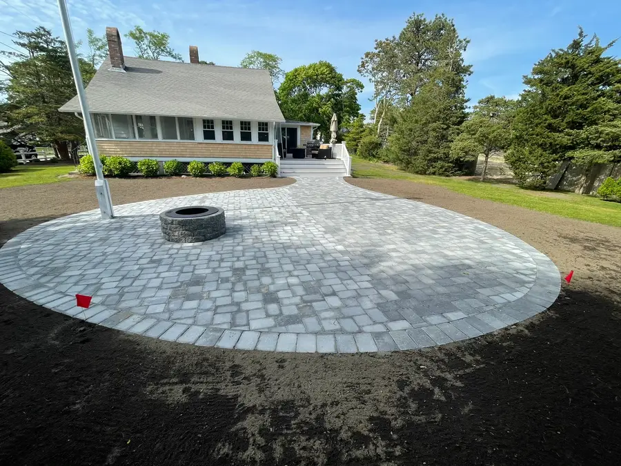 Stone fire pit patio built by John G. Sears & Son on Cape Cod